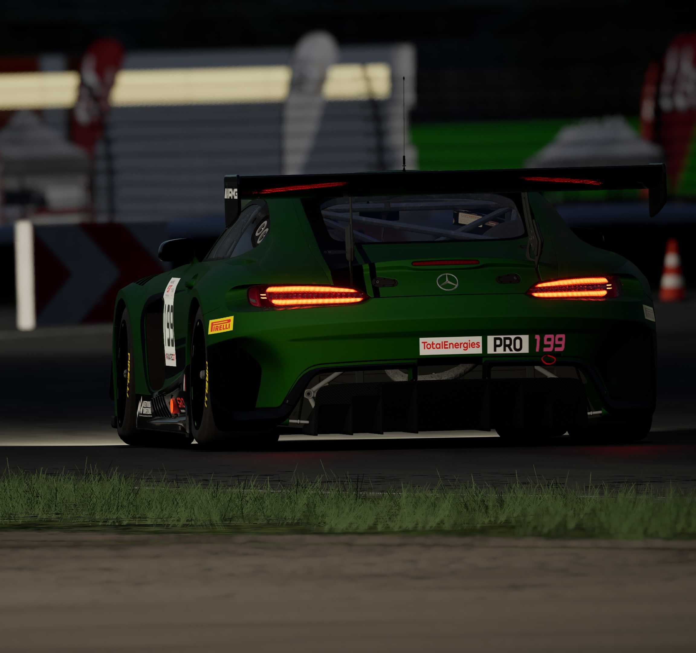Nussy Motorsport car exiting a corner at night